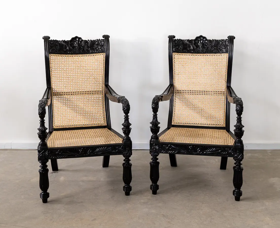 Ebony carved library chairs